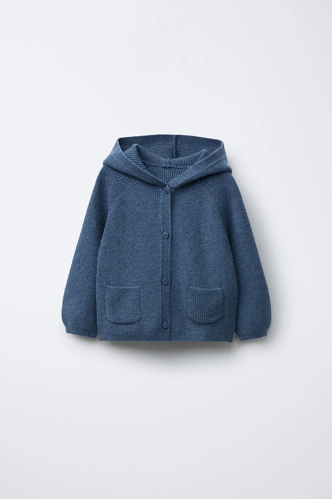 GILET EN MAILLE À CAPUCHE