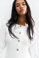 GILET PEPLUM EN MAILLE FINE