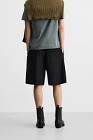 TEXTURED PLEATED SHORTS