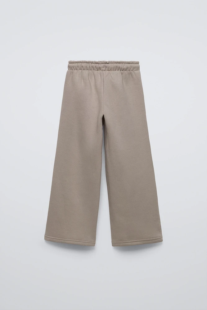 PLUSH WIDE LEG TEXT PANTS