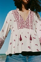 BLOUSE IMPRIMÉE À POMPONS