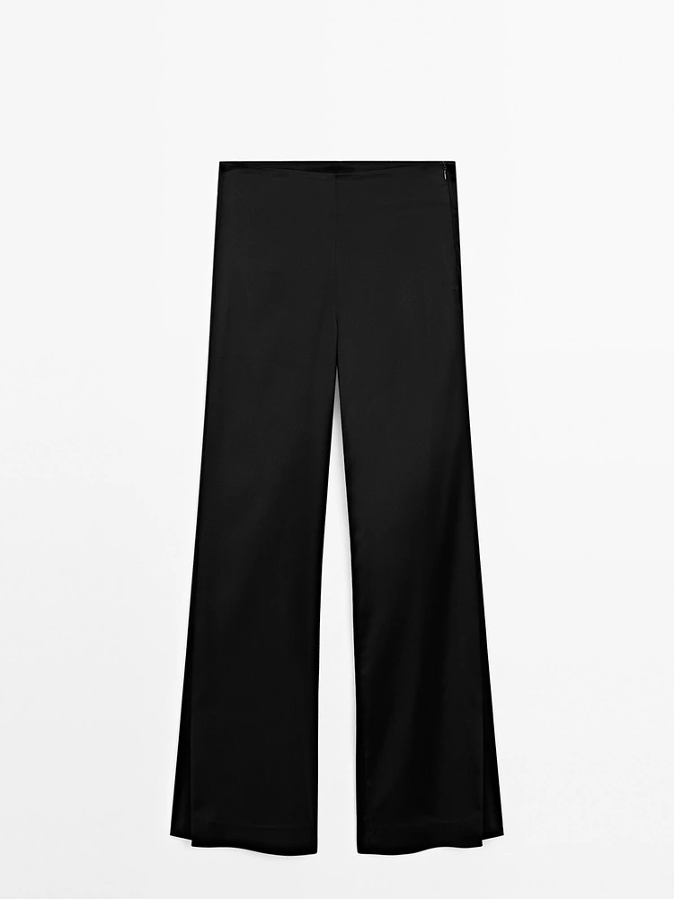 Satin flared trousers with vents