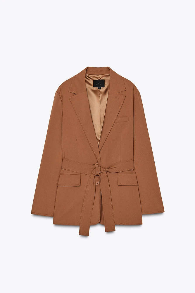 VESTE OVERSIZE À CEINTURE