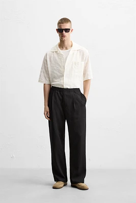FLOWY PLEATED PANTS