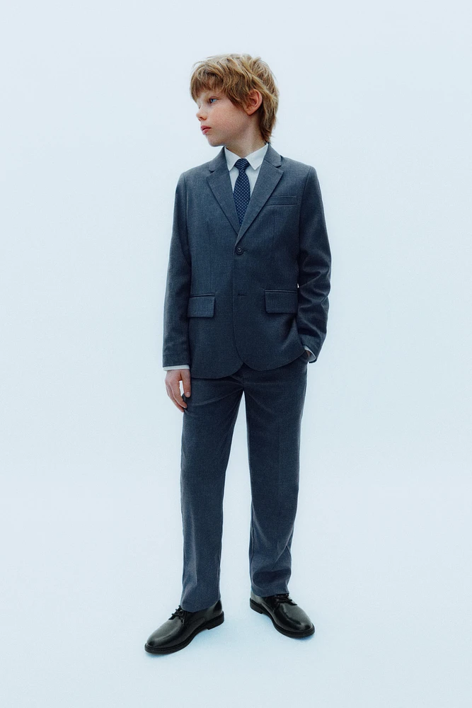 TEXTURED SUIT PANTS