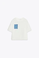 X FANGLU LIN PATCH T-SHIRT