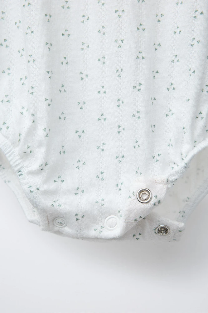 PRINTED BODYSUIT