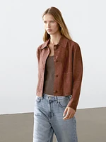 Veste courte boutons recouverts en cuir finition daim
