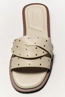 STUDDED CROSSOVER FLAT SANDALS