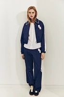 VESTE SATINÉE BANDE LATÉRALE