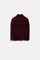 CAPE EN MAILLE AVEC FRANGES