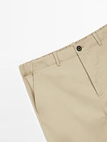 Trousers with patch pocket