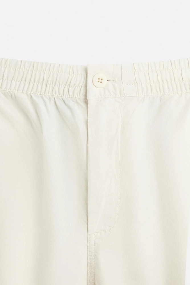 PANTALON DÉLAVÉ AVEC TAILLE JOGGING