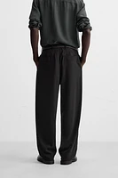 FLOWY PLEATED PANTS