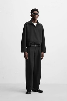 TECHNICAL QUARTER-ZIP SWEATSHIRT