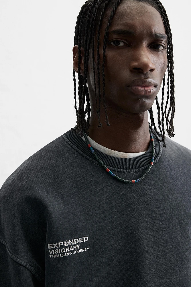 WASHED PRINT BOXY FIT SWEATSHIRT
