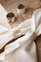 SET OF MOTHER-OF-PEARL NAPKIN RINGS (SET OF 4)