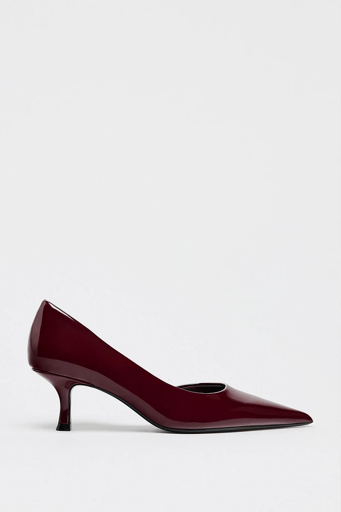 ASYMMETRIC HEELED SHOES