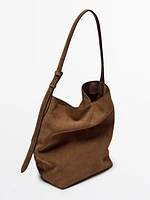 Sac seau en croûte de cuir