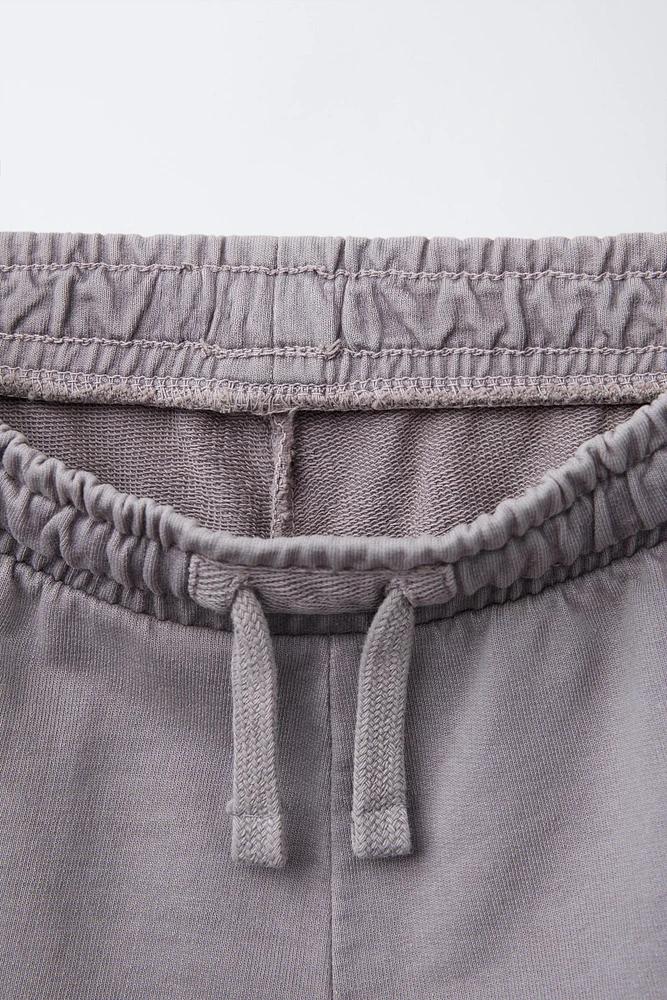 PLUSH SHORTS WITH EMBROIDERED LABEL