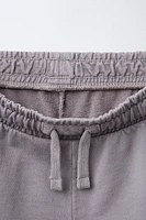 PLUSH SHORTS WITH EMBROIDERED LABEL
