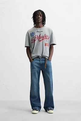 T-SHIRT DÉLAVÉ BRODERIES EN MATIÈRES VARIÉES