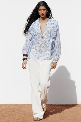 BLOUSE IMPRIMÉE VOLANTS PLIS NERVURÉS