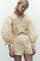 PLEATED LACE LIMITED EDITION SHORTS
