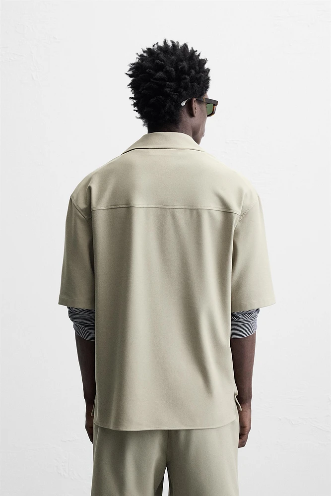 TECHNICAL ZIP POLO SHIRT