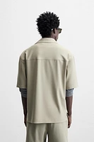 TECHNICAL ZIP POLO SHIRT
