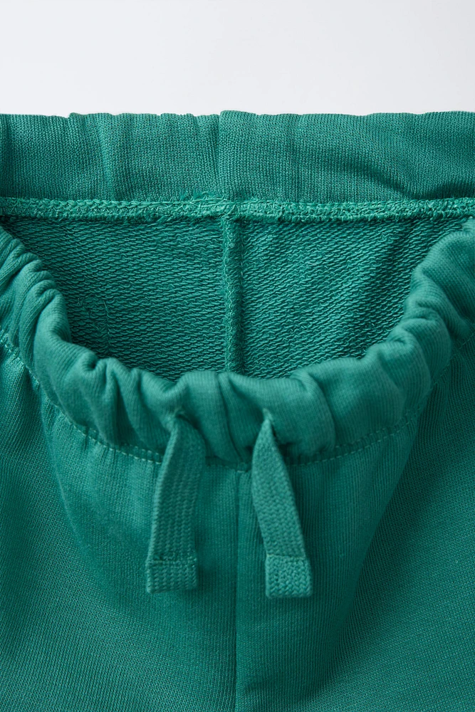 TEXT PLUSH SHORTS