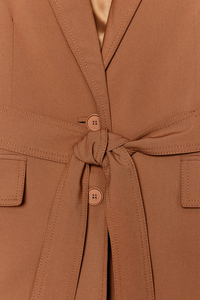 VESTE OVERSIZE À CEINTURE