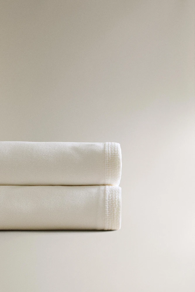 EMBROIDERED BEDSPREAD