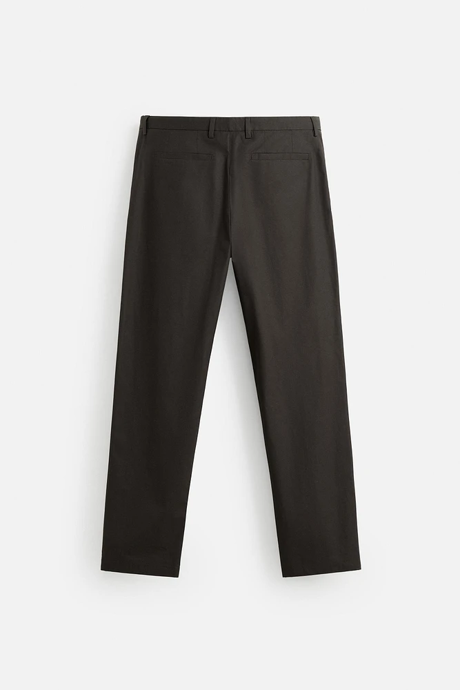WAXED EFFECT SUIT PANTS