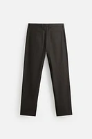 WAXED EFFECT SUIT PANTS
