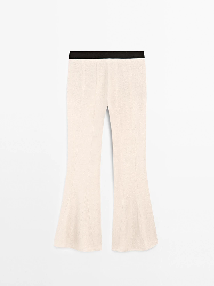 Pantalon flare taille contrastante