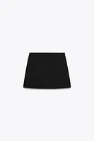 SPLIT SKIRT WITH BUTTONS