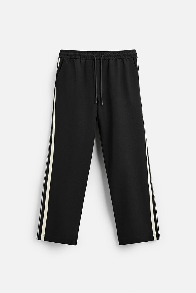TECHNICAL PANTS WITH BANDS