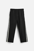 TECHNICAL PANTS WITH BANDS