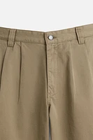 PANTALON RELAXED FIT À PLIS