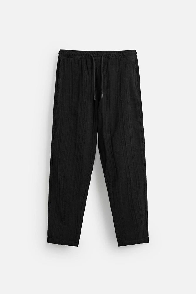 TEXTURED RELAXED FIT PANTS