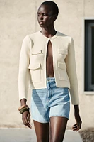 GILET EN MAILLE AVEC POCHES