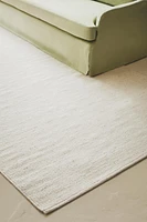 LIGHT-COLORED WOOL AREA RUG