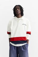 POLO À BANDES EN CONTRASTE