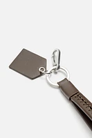 PORTE-CLÉS À SURPIQÛRES