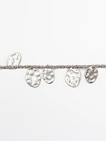 Bracelet pièces de monnaie