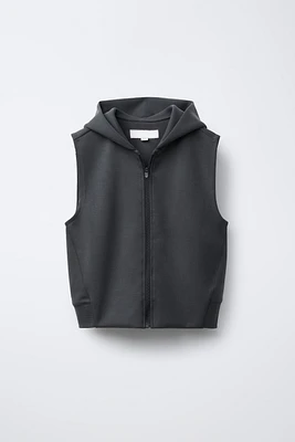 GILET À CAPUCHE SPORT