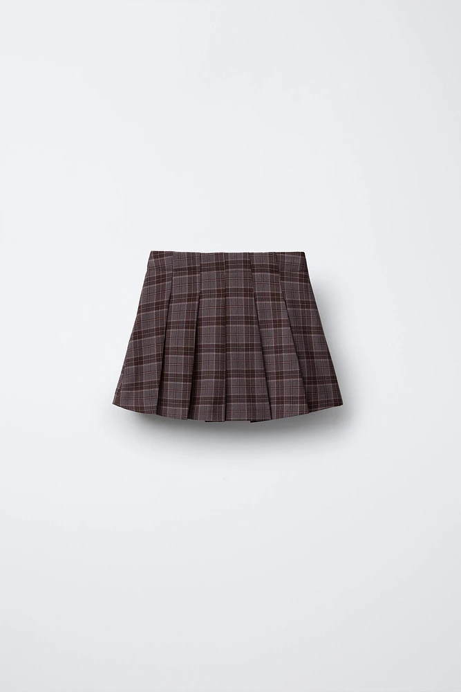 JUPE-SHORT À CARREAUX AVEC BOUCLES
