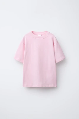T-SHIRT UNI À ÉTIQUETTE