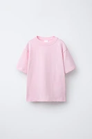 T-SHIRT UNI À ÉTIQUETTE